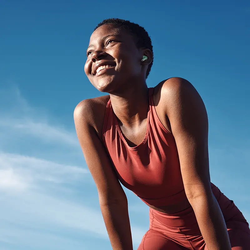 happy woman playing sports